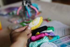 Collection of crochet supplies and handmade craft materials